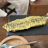 Warm creamy avocado toastt  at La Casita Jardín in Altea
