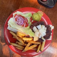 Burger with added pineapple 👌🏼  at Tranquilo Cafe in Corn Islands
