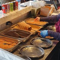 Coating the chimney at Chimney Cakes Lady in North West London