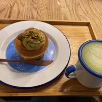 Pistachio cream and matcha latte with oat milkk  at British Patagonia in North London