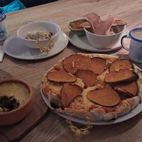 Sourdough and cheese, vegan pepperoni pizza and hot chocolate at British Patagonia in North London