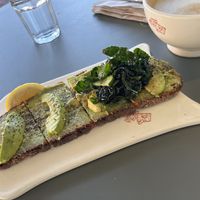 Avocado toast with latte (request for Oatmilk)    at Le Pain Quotidien - Pennsylvania Ave in Washington