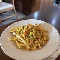 Loaded fries with creamy coconut curry   at Y Sospan in Dolgellau