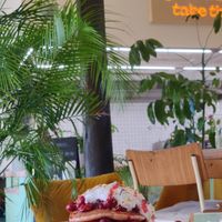 €14.90 pancakes with coconut and cherry compot. at Blumental in Berlin