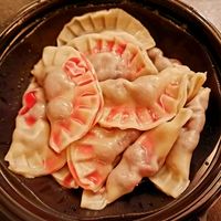 Cherry dumplings with strawberry syrup at Vareniks in Haifa