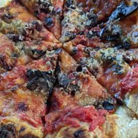 Pizza with vegan cheese at Prodigy Brewing in Logan