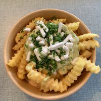 Greek Fries mit Lemon-„Schafskäse" Sauce  at Swing Kitchen in Munich