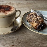 vegan saussage roll and almond cappuccino  at Boulangerie Jade in South East London
