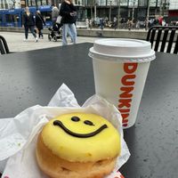 Tea with oat milk and smiley vegan doughnut 🙂  at Dunkin' - Gustaf-Gründgens-Platz in Dusseldorf