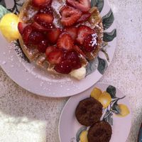 Vegan (gluten free) waffle with strawberries, and vegetarian (Morning star) sausage  at Malia's Cafe in Ocean City