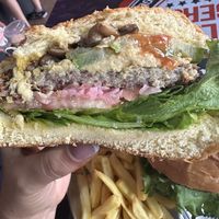 Has onions,salad,hummus,mushrooms    at Ridiculous Burger in Jaco