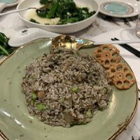 truffle fried rice and stir fried season vegetables in the back  at Supreme Dumplings in Bellevue