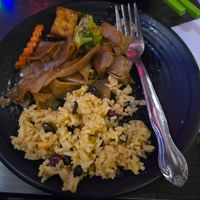 Curry fried rice and noodle dish 😋 at Plumeria in San Diego