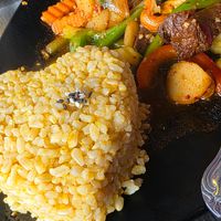 Cashew with Mock Duck Brown rice 🍚 at Plumeria in San Diego