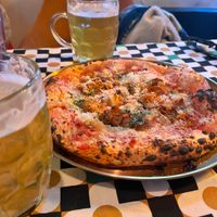 Pizza supremo (with kimchi & tofu) and beer. at Secret Place in Tbilisi