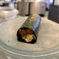 Soft aburi marinated tofu, spring onions and tempura crumbs in a handroll at RAPPU Handroll Bar in Central Singapore