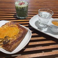 French onion danish with oat milk iced dairy duster matcha and house blend espresso   at Presta Coffee Roasters in Tucson
