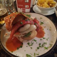 burger and fries at Hanul Lui Manuc in Bucharest