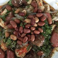 Mock shrimp, mock fish balls, veggie sausage, seitan, thick chewy glass noodles, peanuts, cilantro and sesame seeds in chili sauce  at Chepa Phon Phan Restaurant - ຮ້ານອາຫານເຈປ້າພອນພັນ in Luang Prabang