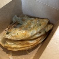 Green onion pancake (half eaten )   at Cha Community in Temple