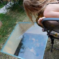 Floor window to observe the kitchen at Il Colibri in Calci