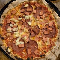 Meat lovers (ham+pepperoni) $26.00 (inc +$2 vegan cheese): cardboard-y crust, needs more flavour/herbs at Papa G's Pizzeria in Blacktown