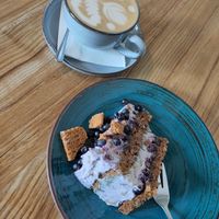 Lotus blueberry Cake and Cappuccino at Kawastrofa in Wroclaw