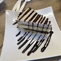 Vegan Cake Slice w/Extra Chocolate Sauce to Share 😋  at Happiness Cafe in San Jose