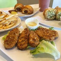 Nuggets, fries, hotdogs, avocado spring roll at Happiness Cafe in San Jose