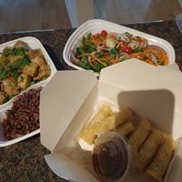 glass noodle salad, fried rolls, and garlic tofu at Vegan Plate in Chicago