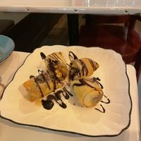 Banana spring rolls, fried banana with coconut and chocolate 🍫🍌🥥.  at Vegan Plate in Chicago