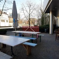Outdoor seating at river (in winter) at Moudi Bar - Talacker in Zurich