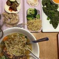 Kids’ bento box with seitan and a kids’ noodle bowl with tofu. Also pictured:  vegetable dumplings.  at Yum Yum Noodle Bar in Woodstock