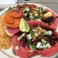 Alpastor taco, chorizo taco, beans & rice  at Rico Rico Vegano in Oakland