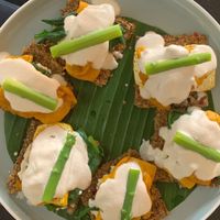 tofu benedict on raw, gf crackers at Living Food Lab Canggu in Canggu