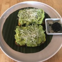 Avocado on pumpkin bread at Living Food Lab Canggu in Canggu