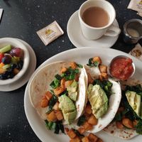 Breakfast tacos, coffee, and fruit at Monument Cafe in Georgetown
