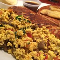 Combo plate: Pancake, tofu scramble with veggies, and house potatoes. Tasty.  at Herbivore - Divisadero in San Francisco