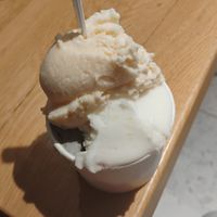 Honeydew on top, lemon to the right, and grey ice cream at the bottom is sesame. at Friddi in Bucharest