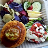 Lentil burger with bbq, guac, chips and fruit.  at Simple Bliss Cafe in South Lake Tahoe