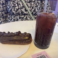 Cherry iced tea with a snickers eclair  at Cream Dream - Covent Garden in London