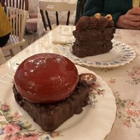 Top cherry mousse was good, bottom dry, super hard and super sweett  at Cream Dream in London