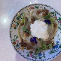 Varenyky With Cabbage:

Savory dumplings with stewed cabbage, accompanied by fresh salad greens and a side of vegan sour cream. at Cream Dream - Covent Garden in London