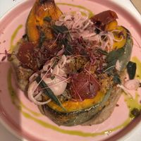 Crown Prince squash, crispy sourdough breadcrumbs, chestnut purée, creamed Brussel sprouts, quince, sage, pickled shallots (vegan)  at Little Brunette Bakery in Southwell