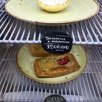 On top: vegan basket with oranges and cream. Below: vegan puff "cabriolet" with mint cream, melon and strawberries at Letters and Numbers in Yerevan