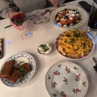 Potato cake with 🌱 cream and tofu scratchings, fires with 🌱 cheese and 🧄 sauce, and „salad” (baked 🎃, black olives, peanuts, 🌱yogurt dressing, mint, and pomegran at Butero in Warsaw