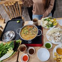 Lẩu riêu hot pot!!! Full toppings under the broth at An Chay in Hanoi