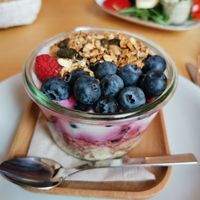 Muesli with vegan yoghurt, berries, nuts at Annegrete in Dusseldorf