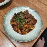 Vegan "spicy" (not) biang biang noodles with tofu at Noodle Fan in Cologne