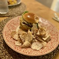 Vegan burger with root veggie chips  at Trova Coastal Kitchen in Humacao
